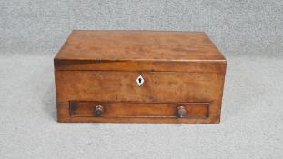 A Georgian mahogany stationery or writing box with fitted interior and base drawer. H.15 W.37 D.26cm