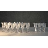 A collection of seventeen cut crystal sherry and port glasses. A set of six Waterford cut crystal