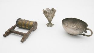 A white metal tea cup and filigree miniature vase along with a brass Islamic puzzle lock. H.10 W.
