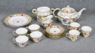 A Victorian porcelain four person hand painted part tea and coffee set. Decorated with various