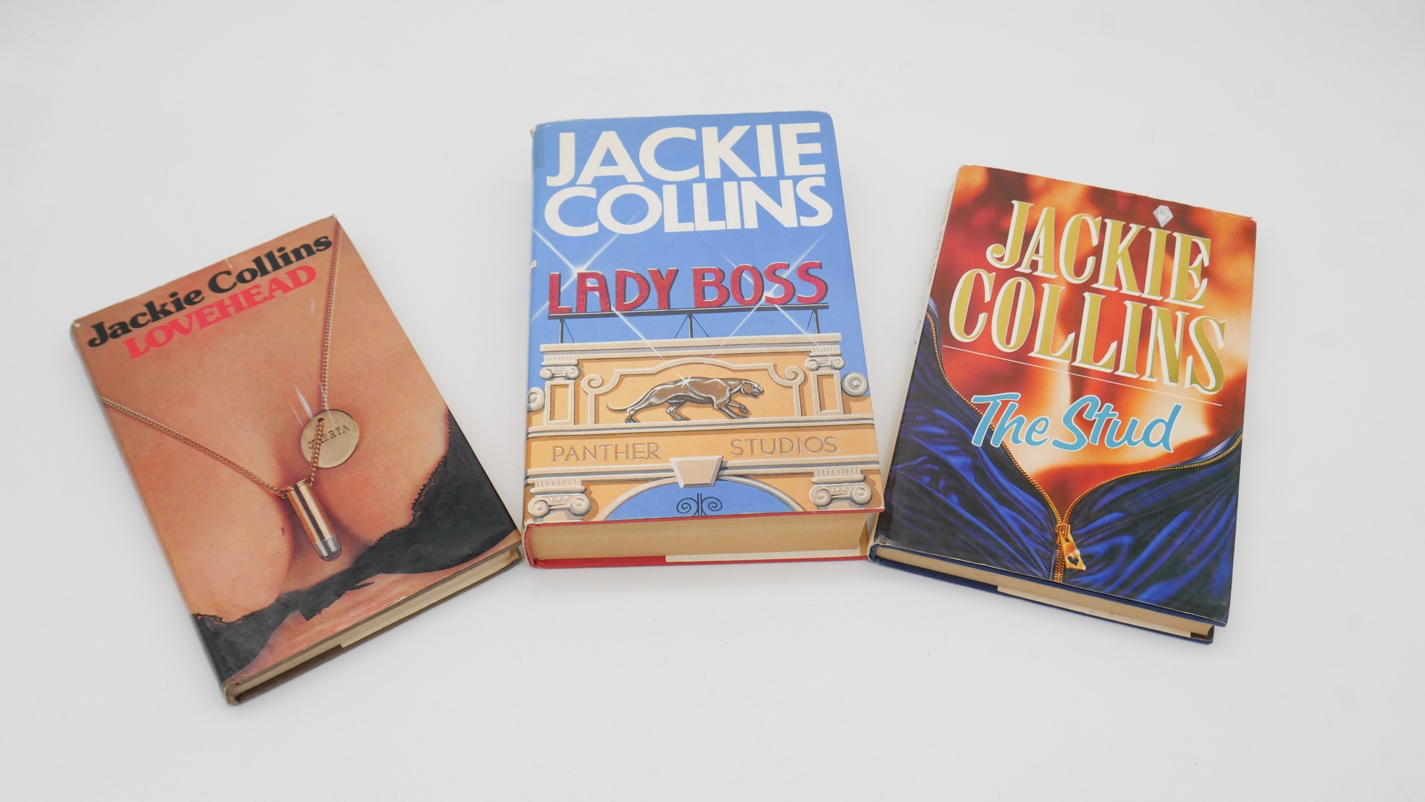 Three hardback Jackie Collins books. Lady Boss, The Stud and Lovehead. Two signed and inscribed to