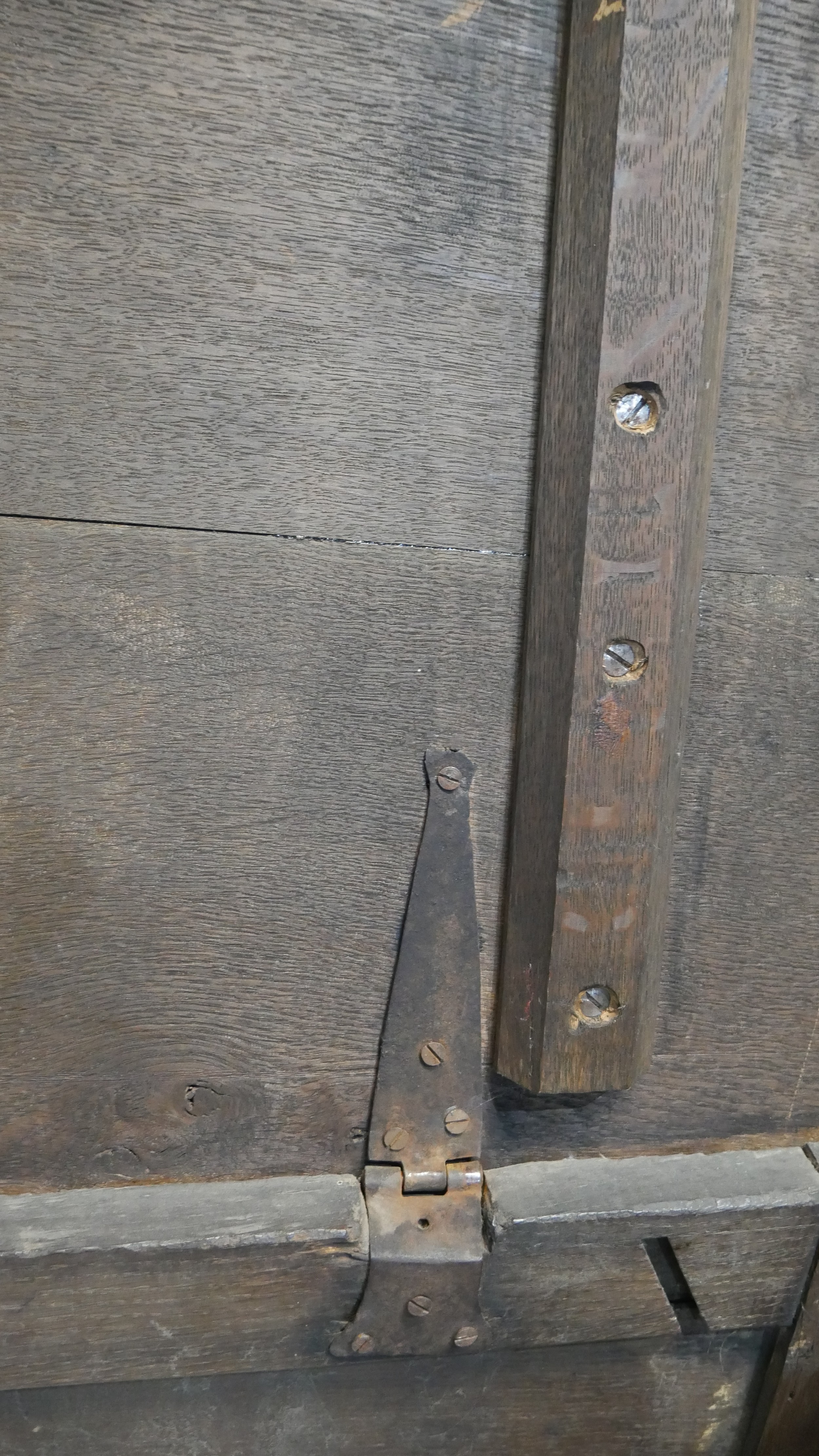 A 17th century oak coffer with lozenge carved panels raised on stile supports. H.54 W.104 D.49cm - Image 8 of 11