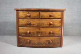 A Victorian mahogany bow fronted chest of drawers. H.92 W.119 D.53cm