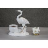 A gilded porcelain white heron jardinière along with a Moore Brothers Soft Paste Porcelain '