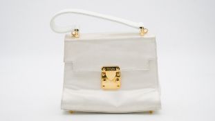 A vintage white satin Fendi evening bag with brass hardware. Brass makers plaque to inside. H.17 W.