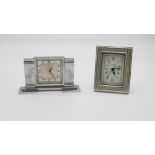 Two clocks. One Art Deco vintage CYMA 8 days chrome mantle clock with engraved inscription. (no