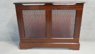 A contemporary stained teak radiator cover. H.87 W.110 D.23 CM