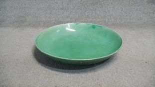 A large Chinese green crackle glaze ceramic charger. Diam.42cm