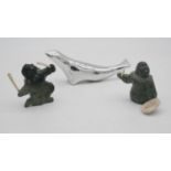 A pair of Inuit carved soapstone and walrus tusk drum dancers along with a Canadian Hoselton