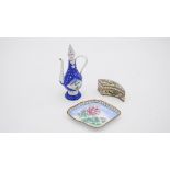 A collection of enamel items. Including a diamond shaped dish decorated with chrysanthemums, a