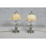 A pair of Art Deco style mottled yellow glass and beaded fringed table lamps. H.36 CM