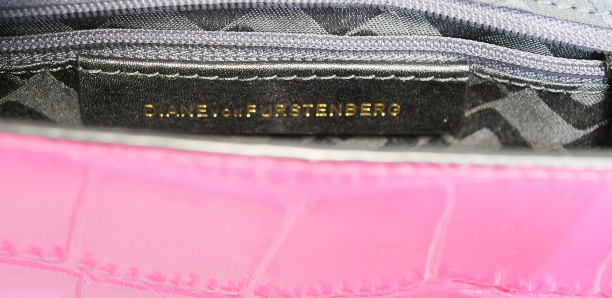 A neon pink Diane Von Furstenberg embossed leather crossbody bag. Brass Hardware and gilded name. - Image 9 of 9