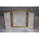 A mid century gilt framed triple dressing mirror. H. 55 W. 84