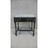 A mid century piano stool fitted with fall front sheet music drawer. H. 57 W. 50 D. 40