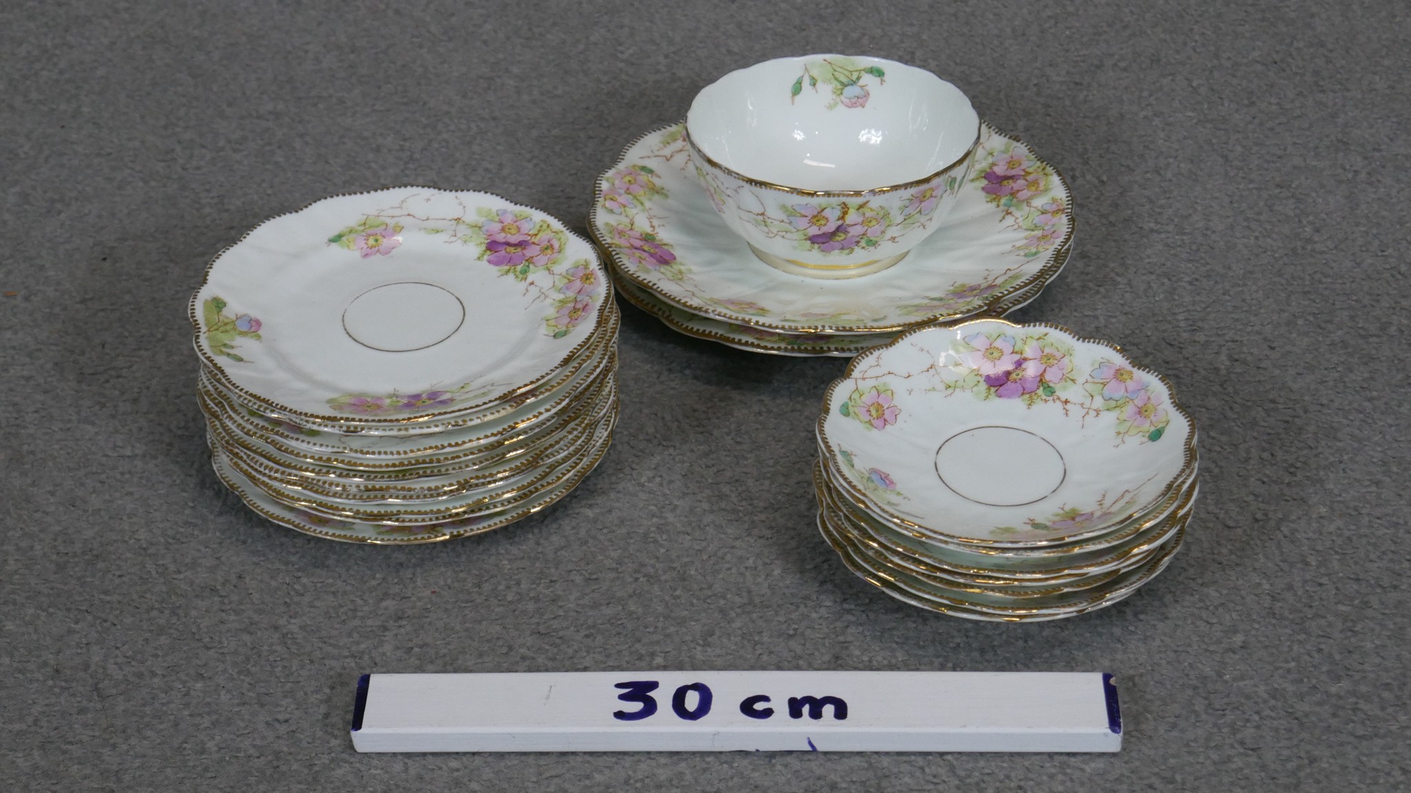 A collection of fine bone china saucers and plates along with a sugar bowl all hand painted with a - Image 2 of 3