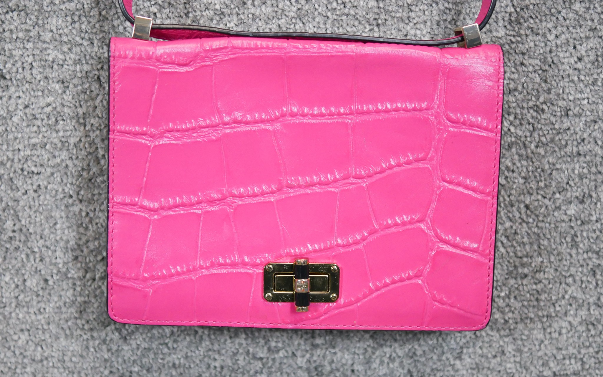 A neon pink Diane Von Furstenberg embossed leather crossbody bag. Brass Hardware and gilded name. - Image 2 of 9