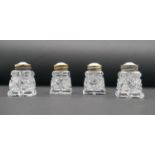 Hroar Prydz - Four silver gilt Norwegian cut crystal salt and pepper shakers with cream guilloche