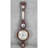 A 19th century mahogany and satinwood inlaid banjo barometer with silvered dials and inset convex