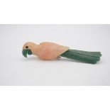 A carved rose quartz and aventurine parrot sculpture with white metal engraved feet. H.7 W.26cm