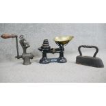 A set of cast iron and brass Viking shop weighing scales along with an iron and meat mangle. H.34
