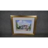 Peter Luscombe- A framed and glazed watercolour of Packford's Hotel, Essex. Label Verso. H. 55 W. 64