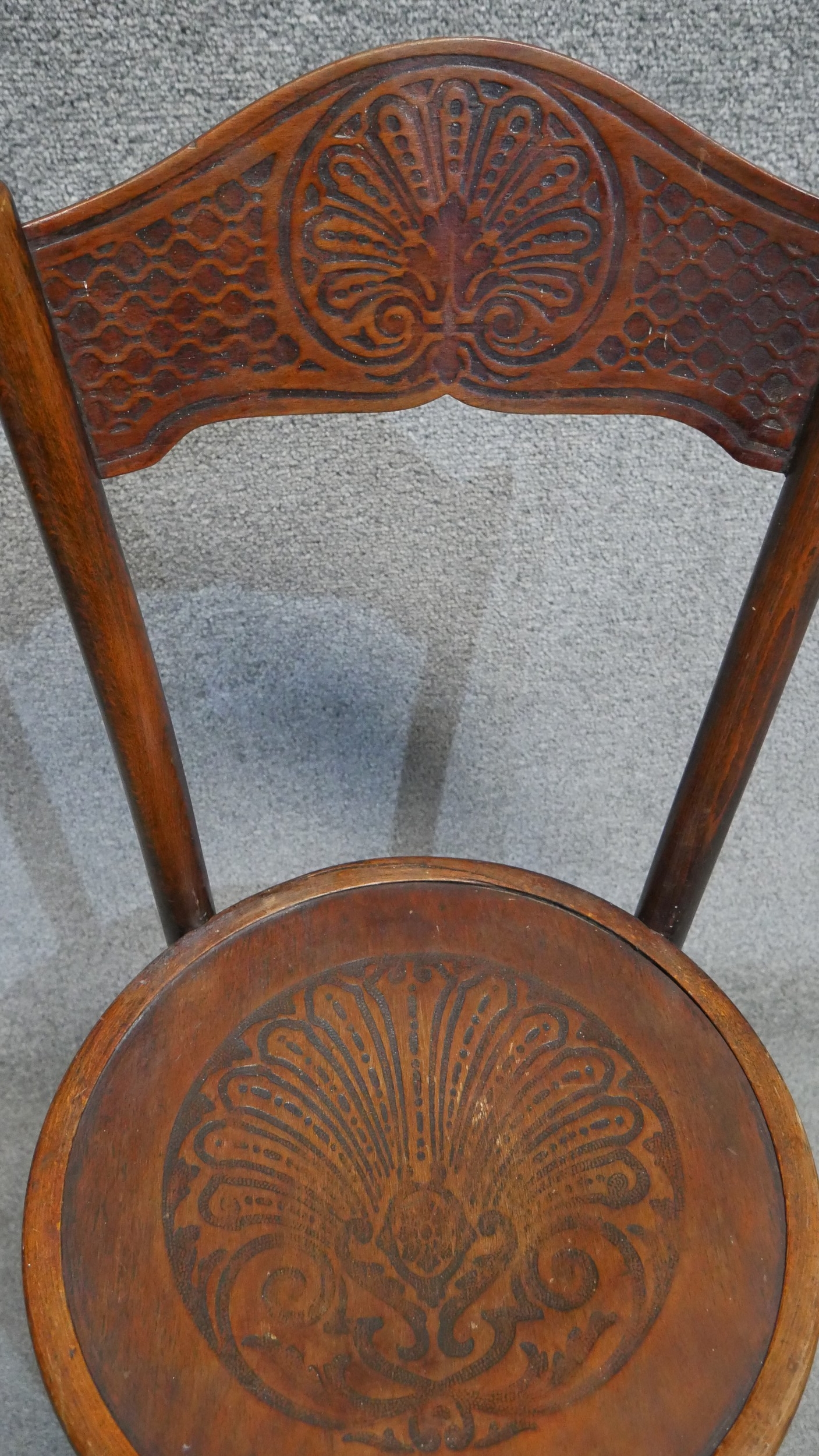 A set of four Mundus 19th century bentwood dining chairs with embossed backs and seats. - Image 3 of 5