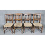A set of four 19th century beech framed chapel chairs with woven seats.