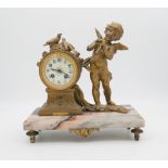 'Enfant Flutiste', a French gilt spelter and marble mantle clock by L&F Moreau. Brass makers