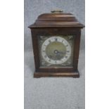 A Victorian Westminster chime mahogany and brass mantle clock. With key. H.30 W.23cm