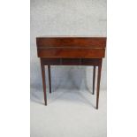 A 19th century mahogany and satinwood inlaid fold out writing desk with fitted interior on base with