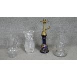 A collection of glassware. Including two hand painted hookah bases and a cut crystal vase. H. 39 (
