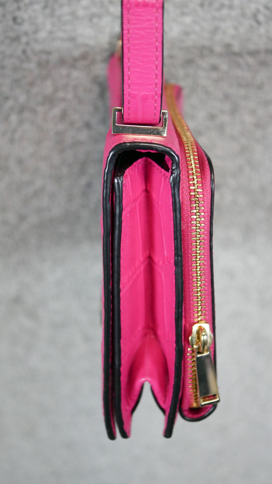 A neon pink Diane Von Furstenberg embossed leather crossbody bag. Brass Hardware and gilded name. - Image 7 of 9