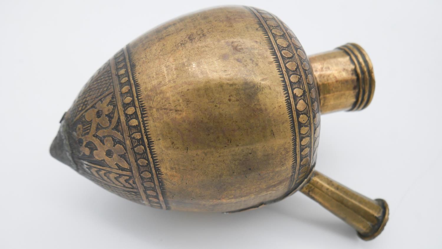A collection of Indian brassware. An engraved bulbous vase with foliate and floral design and a - Image 3 of 4