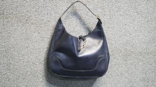 A Vintage 1978 Hermès dark blue box calf shoulder bag. Interior suede leather, brass hardware.