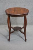 A late 19th century walnut occasional table on cabriole supports united by undertier. H.72 W.59 D.59