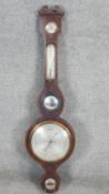 A 19th century mahogany and satinwood inlaid banjo barometer with silvered dials and inset convex