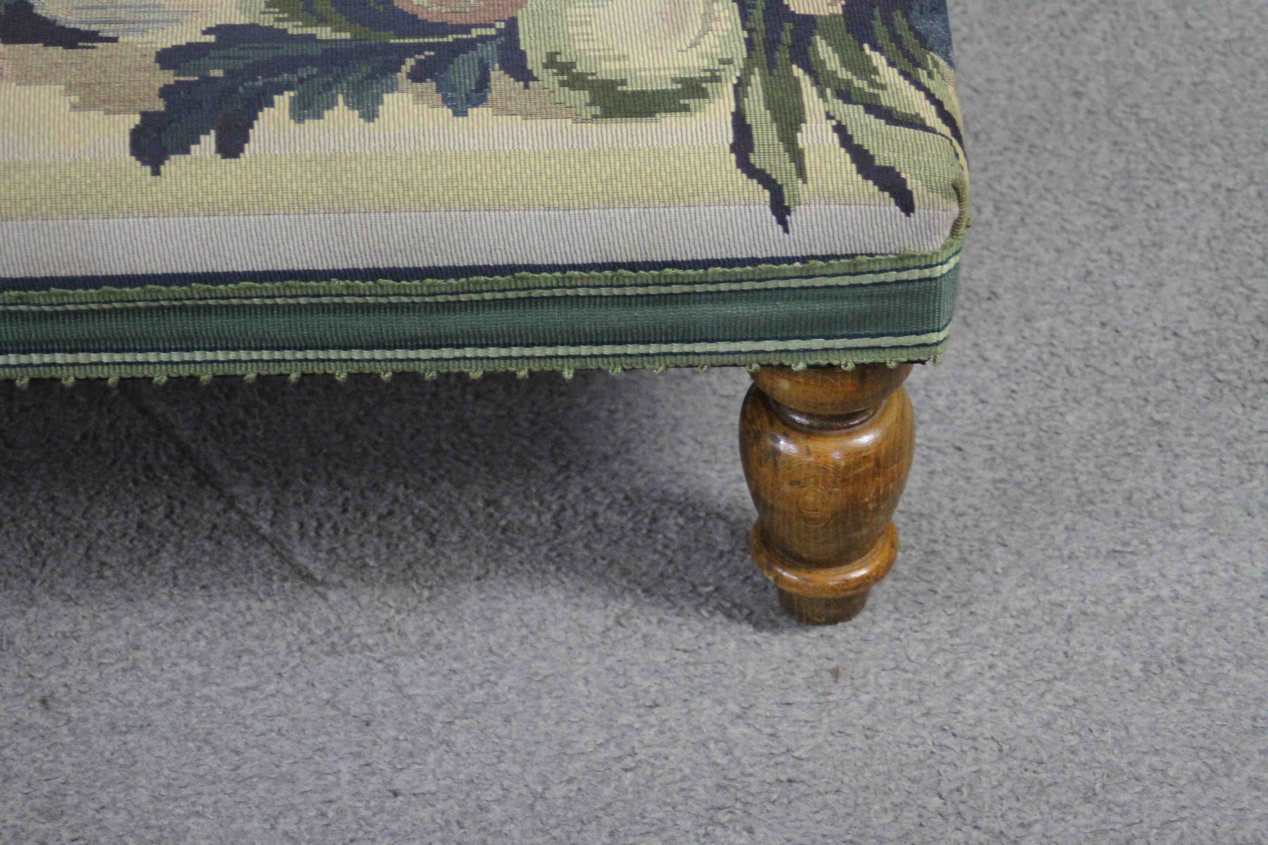 A Victorian style foot stool in tapestry upholstery on beech baluster turned supports. H.24 W.80. - Image 3 of 5