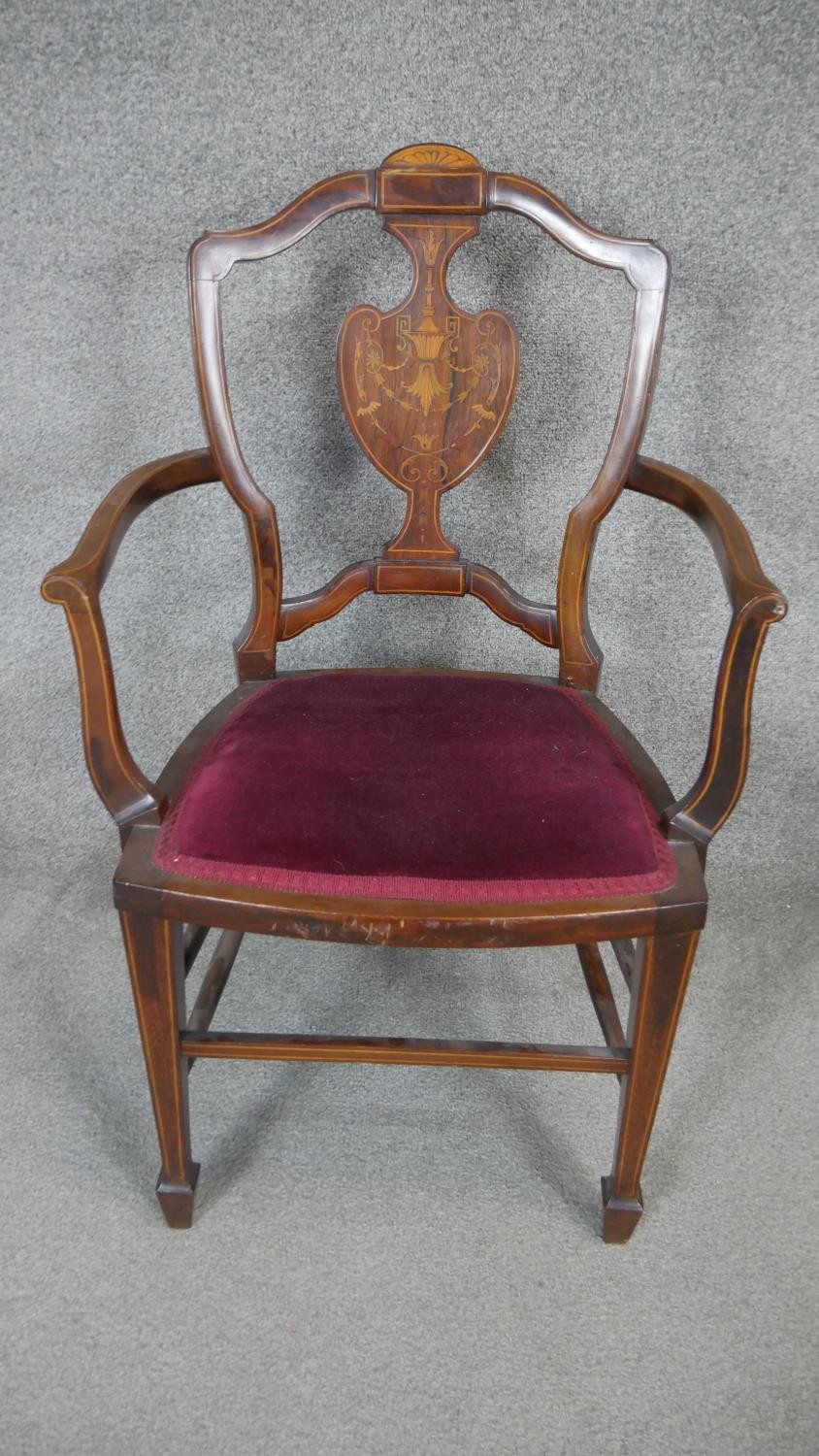 A pair of late 19th century rosewood armchairs with satinwood swag and urn inlay on square - Image 2 of 4