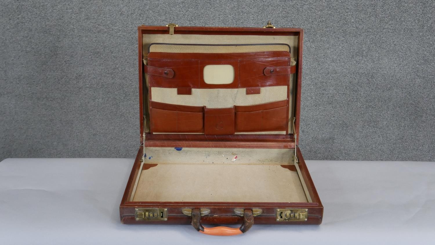 A vintage tan leather brief case with multi partitioned ostrich skin interior and brass hardware. - Image 4 of 6