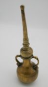 An Indian brass twin handled rose water sprinkler. H.24 W.8cm