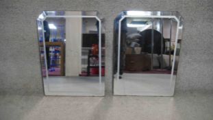 A pair of vintage Art Deco style wall mirrors. H.70 W.50cm