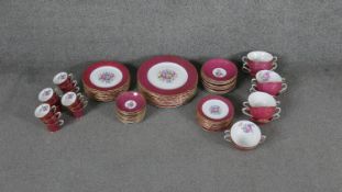 A Vintage red and gold floral design twelve person part COLLINGWOOD bone china dinner set. Stamped
