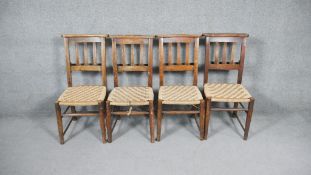 A set of four 19th century beech framed chapel chairs with woven seats.