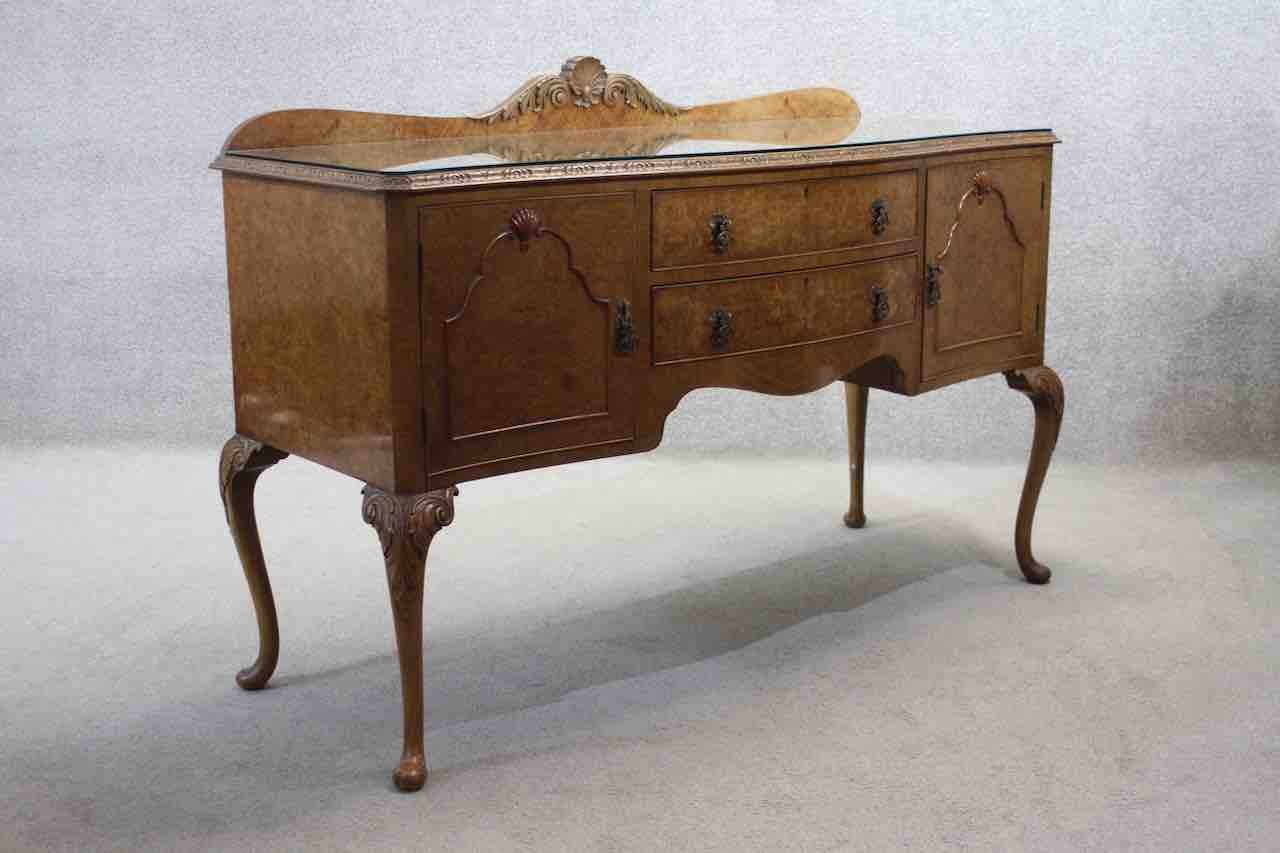 A mid century burr walnut Epstein sideboard with central drawers flanked by cupboards on carved - Image 8 of 8