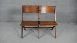 A pair of vintage oak folding church or cinema seats. H.80 W.95 D.55cm
