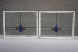 A pair of late Victorian abstract design coloured stained glass windows. H.37 W.47 cm