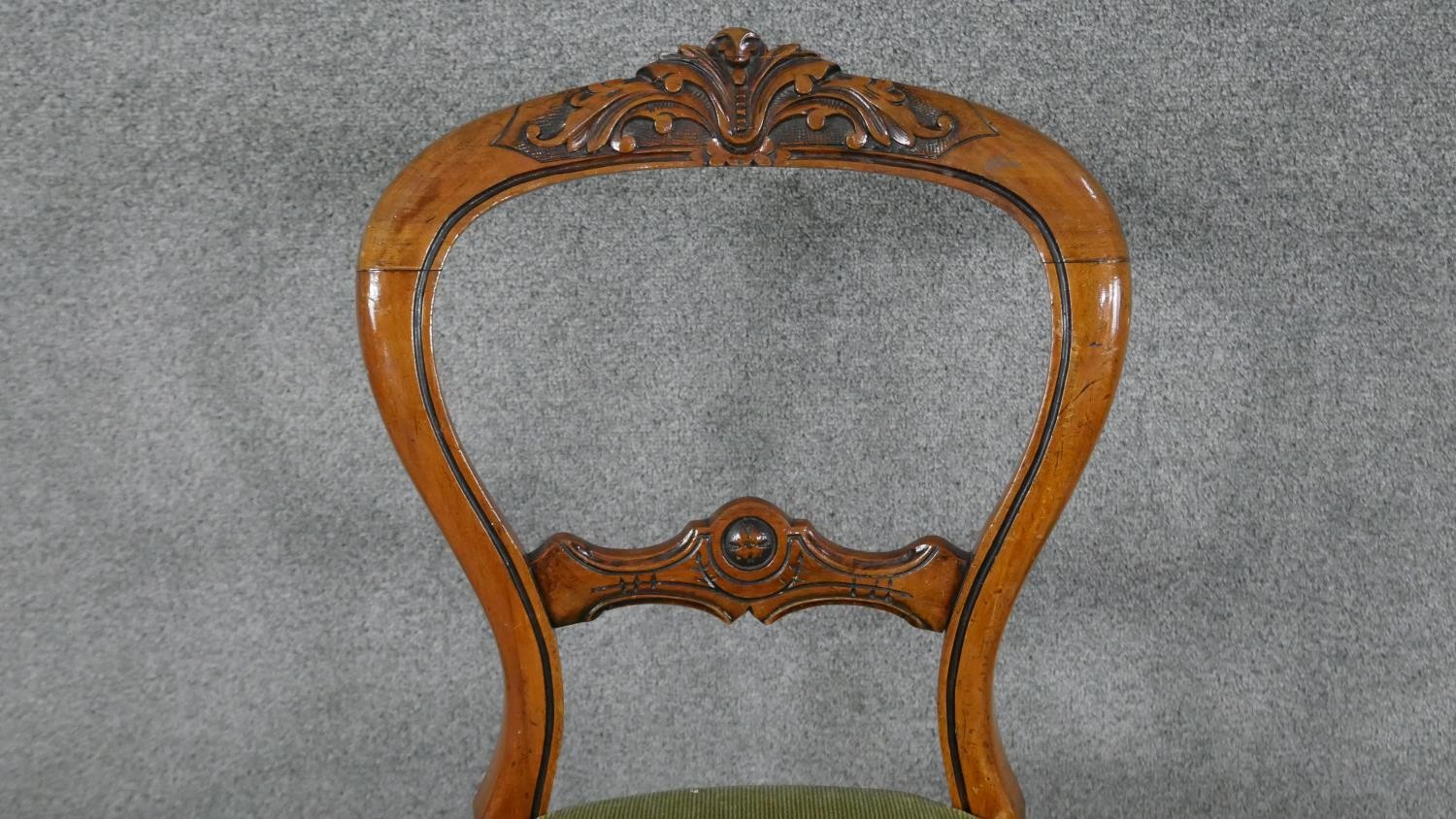 A Victorian walnut framed and ebonised dining chair with carved back rail on cabriole supports. - Image 3 of 5
