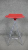 A contemporary revolving high stool with moulded seat on metal base. H.63 x W.33cm