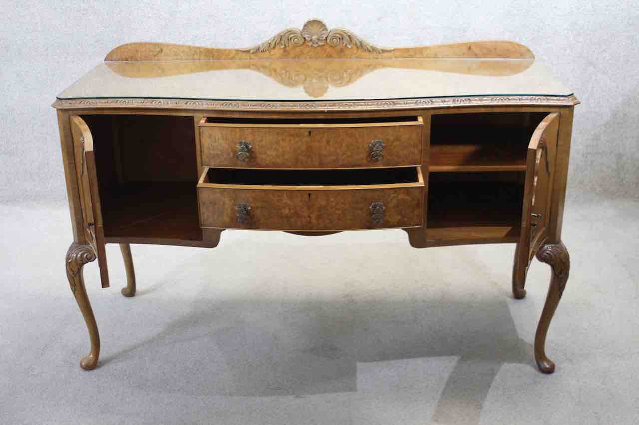 A mid century burr walnut Epstein sideboard with central drawers flanked by cupboards on carved - Image 3 of 8