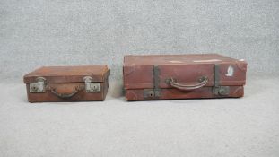 Two brown vintage leather suitcases. One with makers label to inside of lid. H.38 W.57 D.17cm